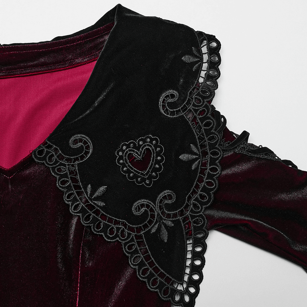 Detail of velvet gradient dress collar featuring heart design and lace trim, showcasing elegance and charm.