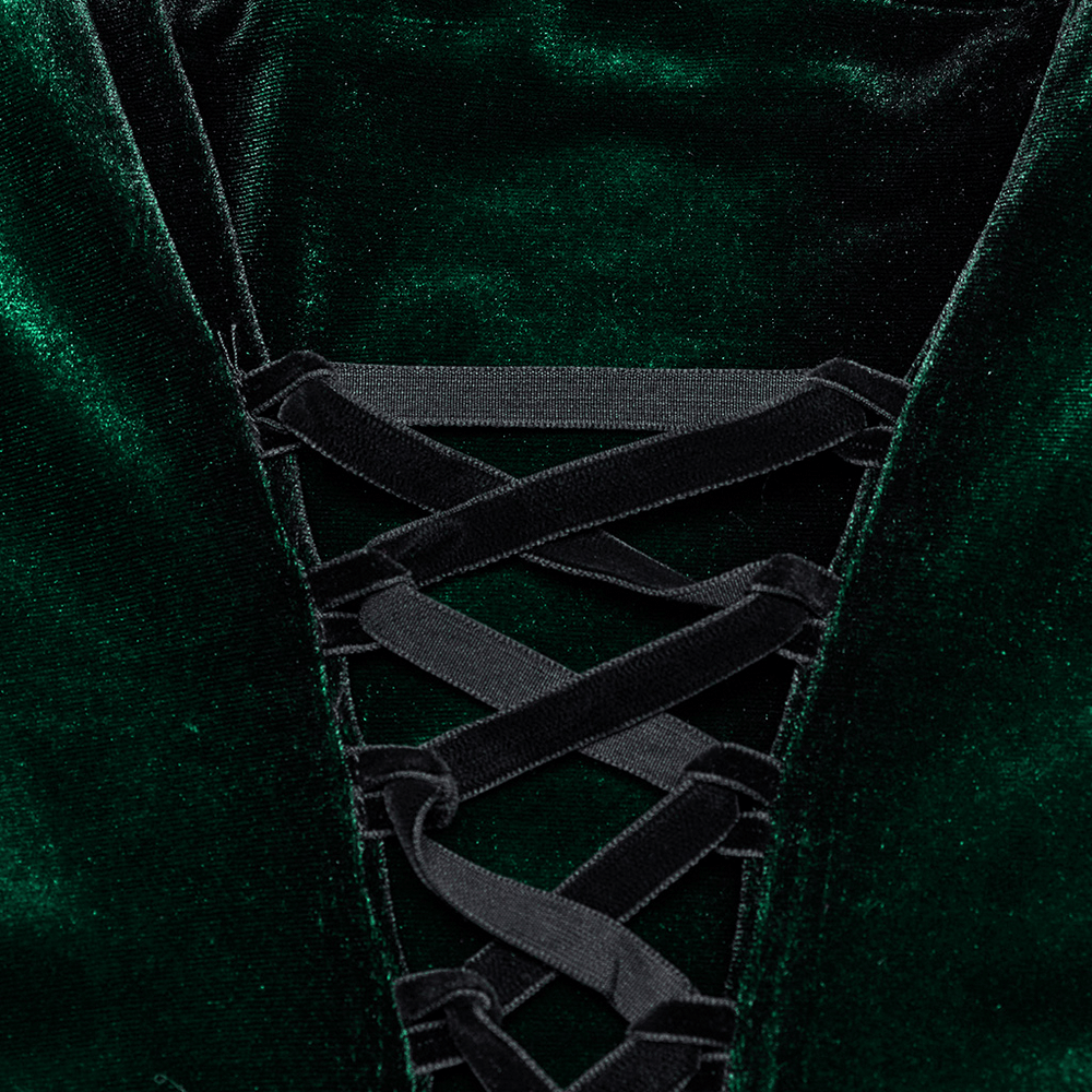 Close-up of green velvet lace-up detail on a gothic dress, showcasing intricate lacing and soft fabric.