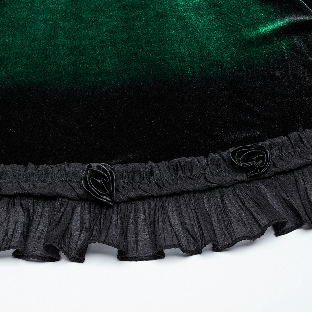 Close-up of a velvet dress hem featuring ruffled black lace and rose accents in a gothic gradient design.