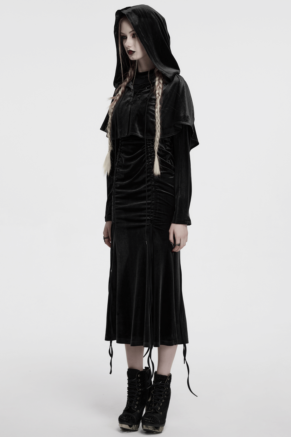 Mystical black velvet hooded cape and dress for fantasy cosplay, featuring playful fur balls and adjustable fit.