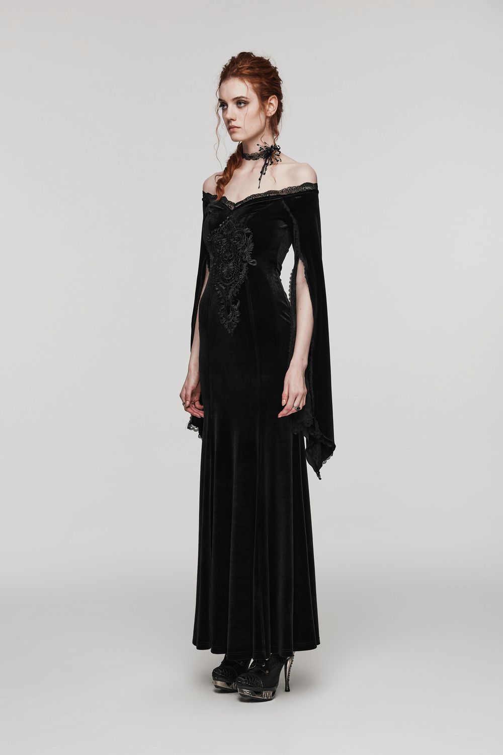 Elegant black velvet lace gothic dress with split sleeves and intricate front decal detail.