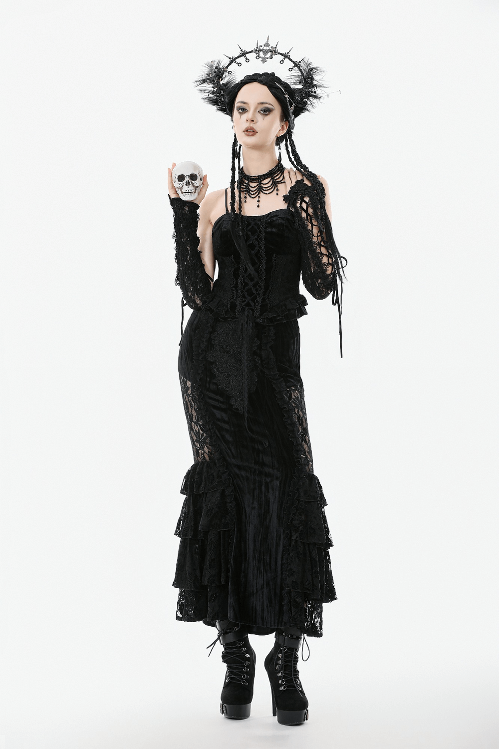 Model showcasing Velvet Lace Ruffled Bustier with Lace Trim and Lace-Up Back, holding a skull, elegant gothic style.