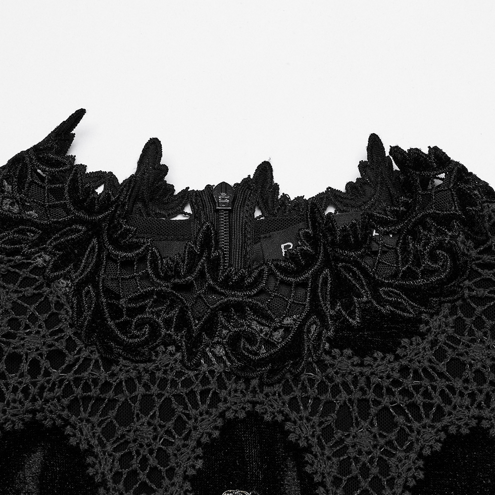 Close-up of a black velvet lace top featuring delicate puff sleeves and intricate key charm details.