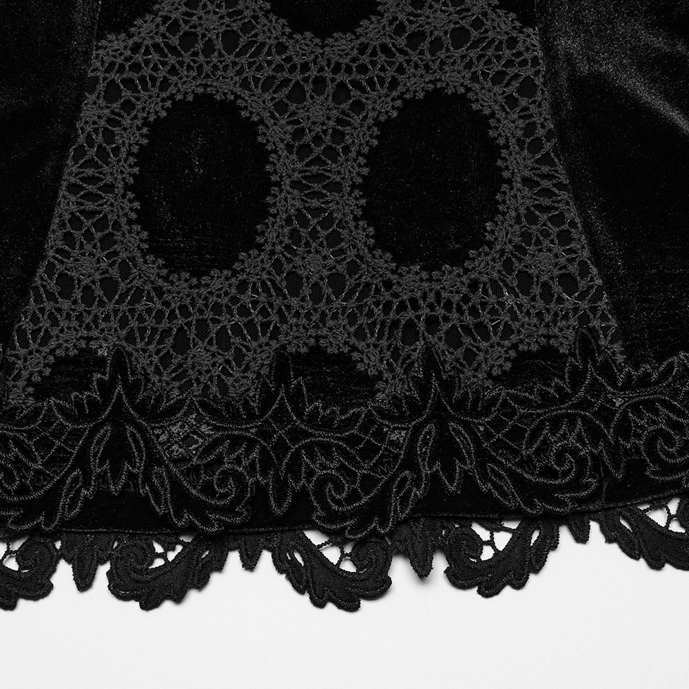 Close-up of black velvet lace top with intricate crochet detailing and delicate floral lace trim.