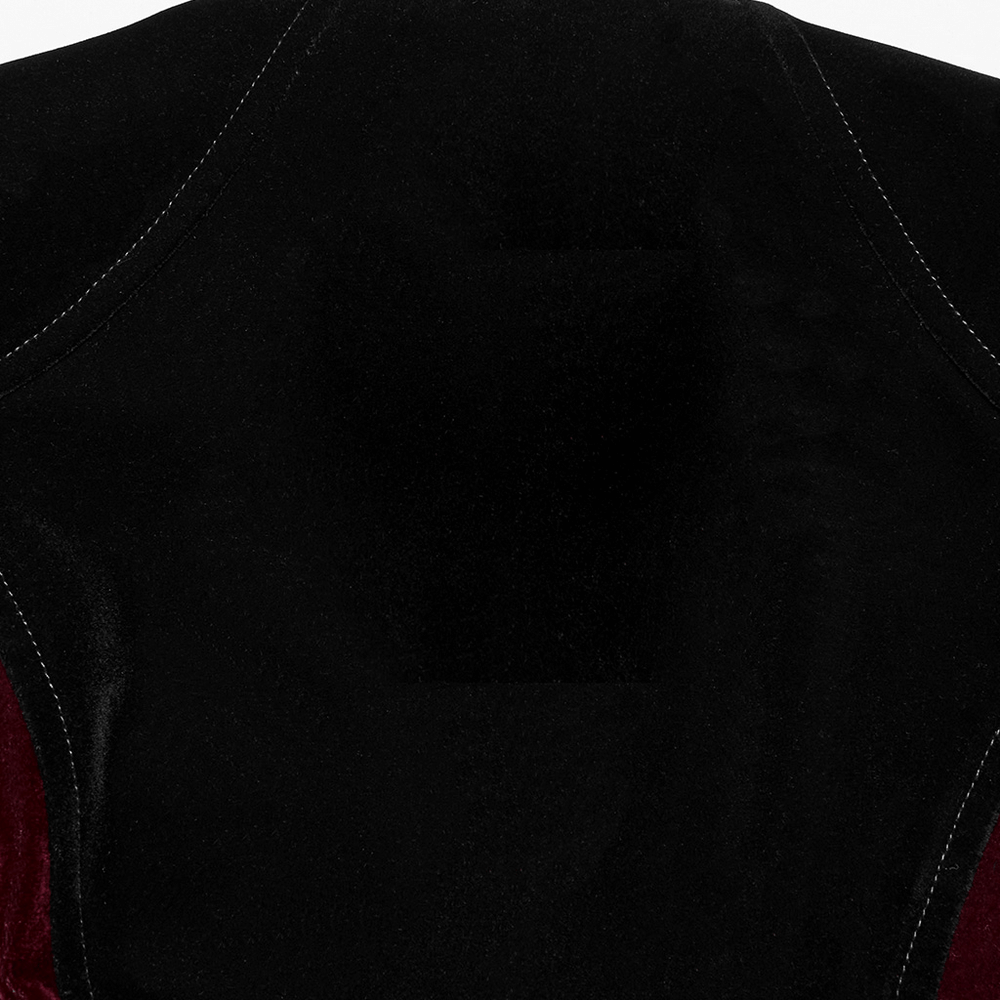 Interior view of the velvet Gothic jacket featuring a deep V-neckline and sleek bat hem design.