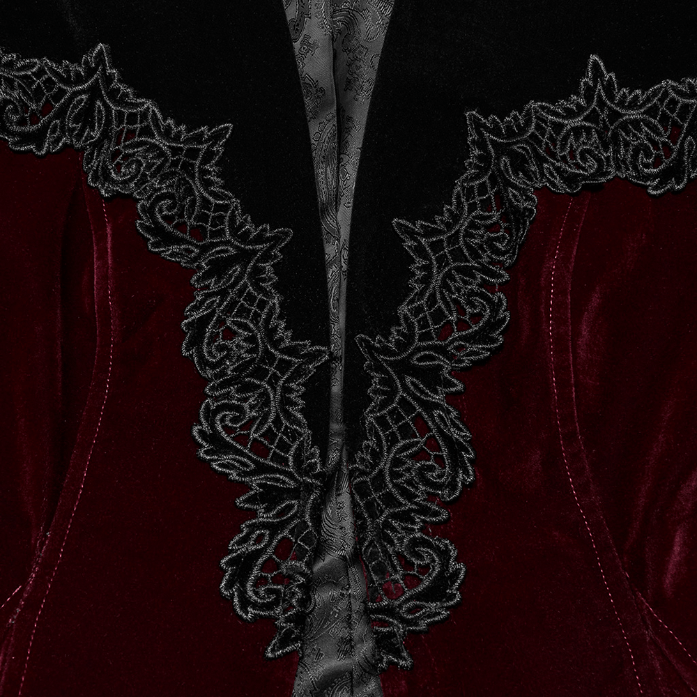 Close-up of intricate lace detailing on the velvet gothic jacket's deep V-neckline, showcasing vintage elegance.
