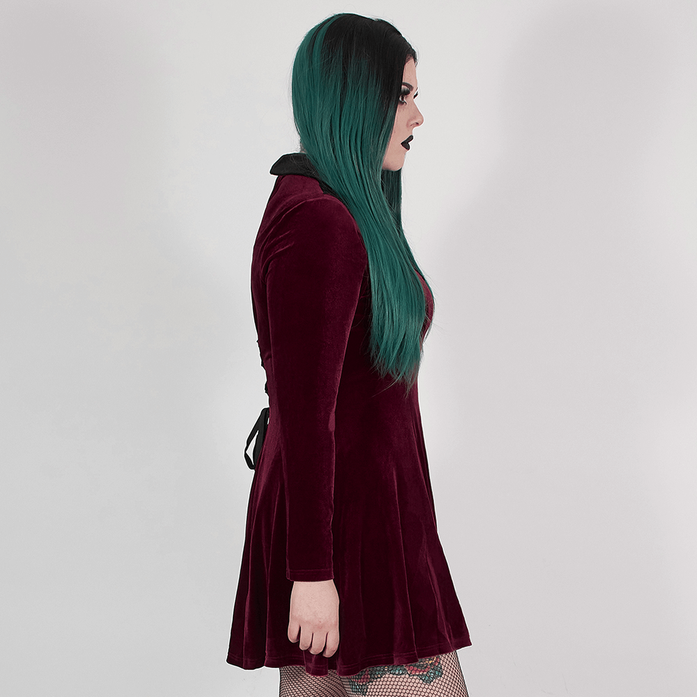 Side view of a gothic velvet lace-up dress with flowing skater silhouette, showcasing elegant dark style.
