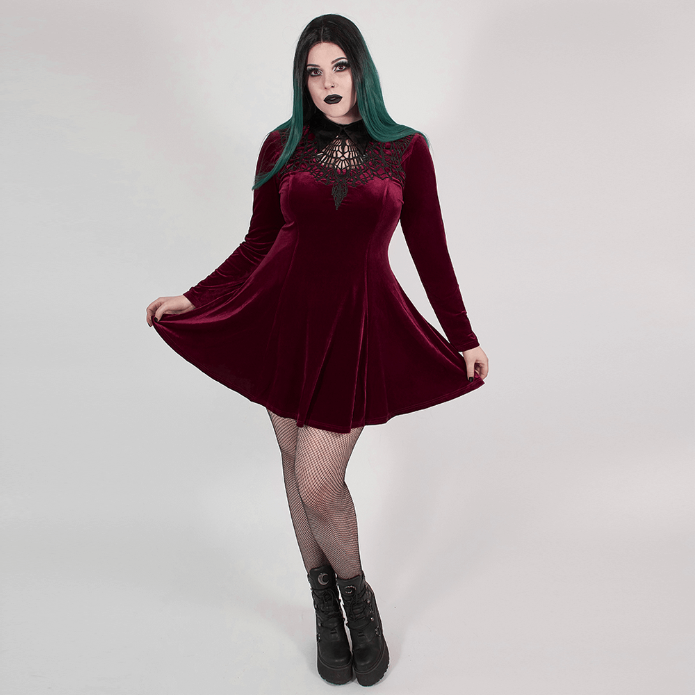 Gothic elegance in a burgundy velvet lace-up dress with hollowed-out chest and flowing skater silhouette.