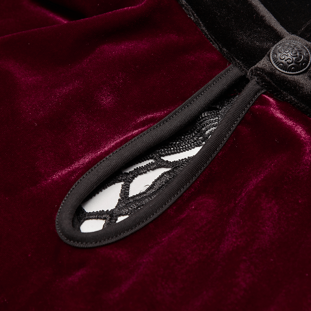 Close-up of gothic velvet dress showcasing lace detail and ornate buckle, perfect for dark elegance and style.