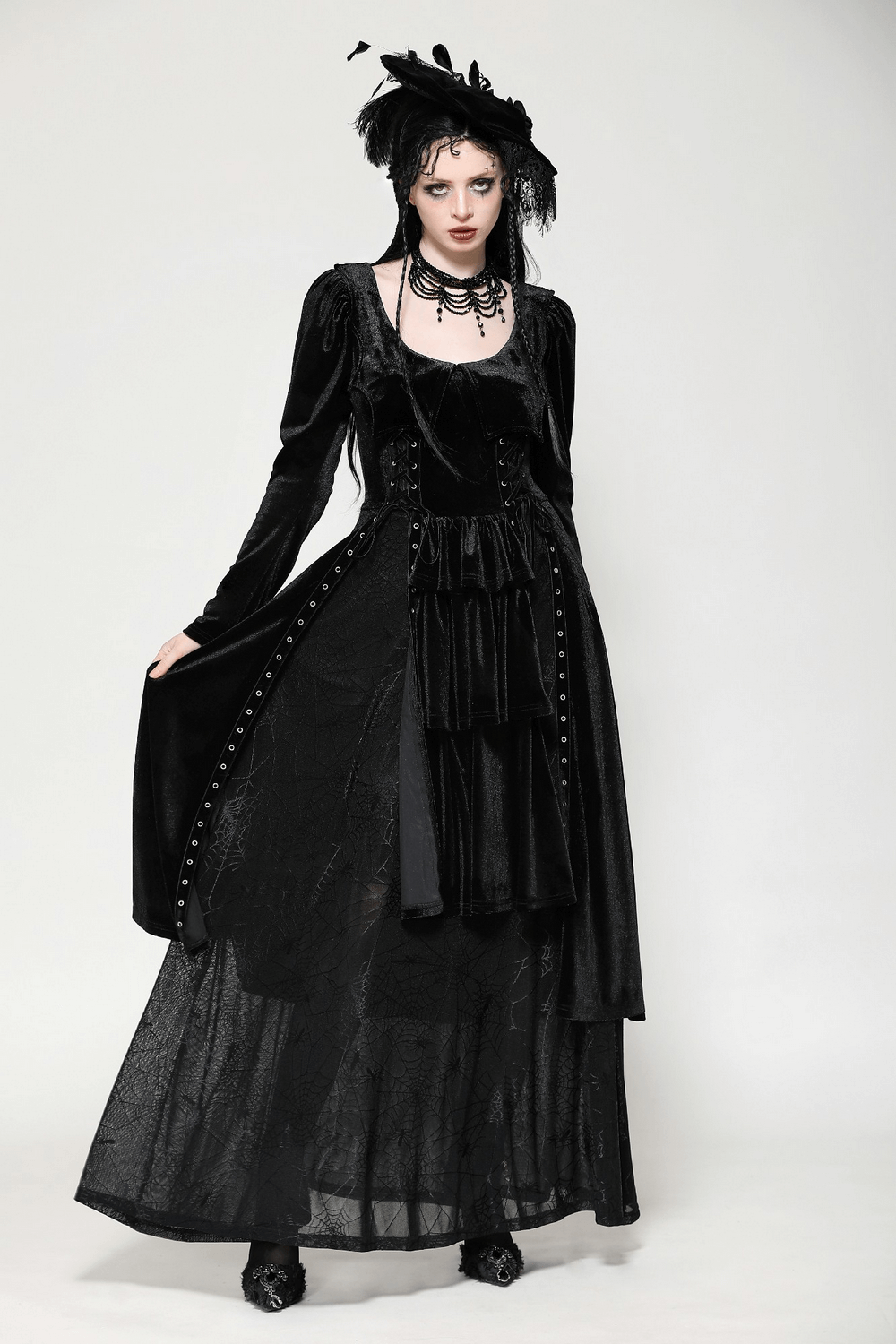 Elegant black lace-up gothic dress with mesh panel, velvet fabric, and Victorian-inspired details. Perfect for dark romance!