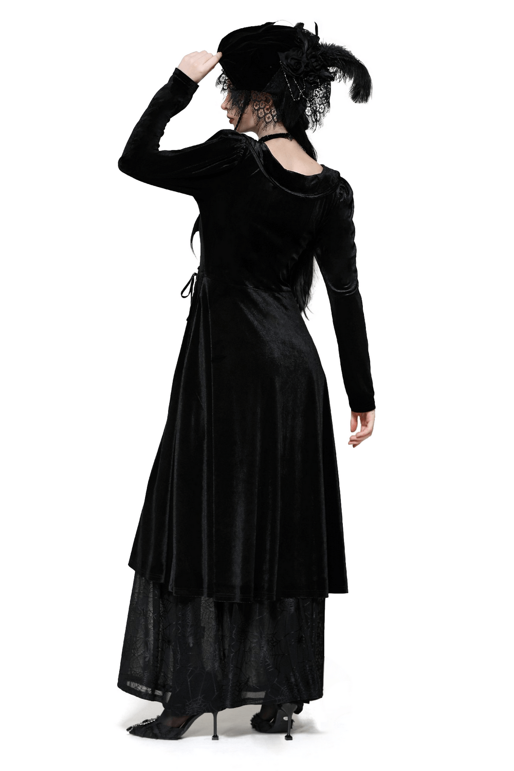 Back view of a Victorian-inspired black velvet gothic dress with a mesh panel and lace-up details. Ideal for dark romance.