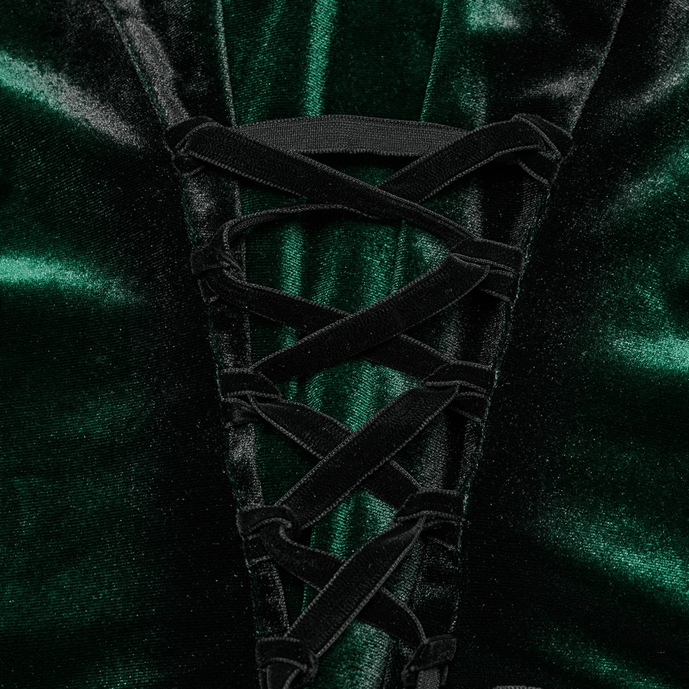 Close-up of the lace-up design on a green velvet gothic shirt showcasing elegant ruffles and bat collar details.