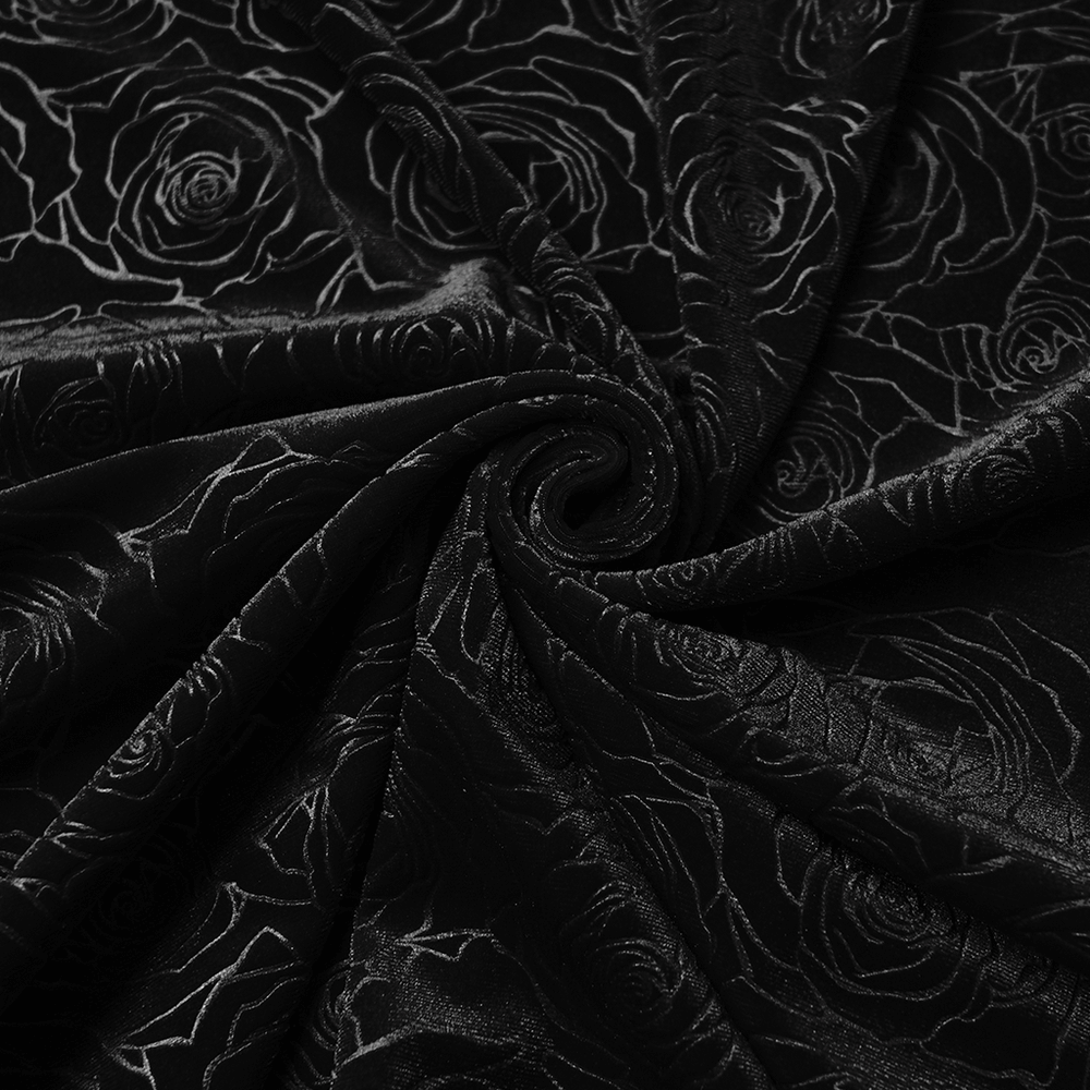 Close-up of luxurious black rose velvet fabric for a Velvet Long Dress with Gem Appliqué and Flared Sleeves.