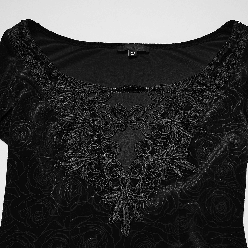 Velvet Long Dress with Gem Appliqué and Flared Sleeves featuring intricate black floral detailing and gem embellishments.