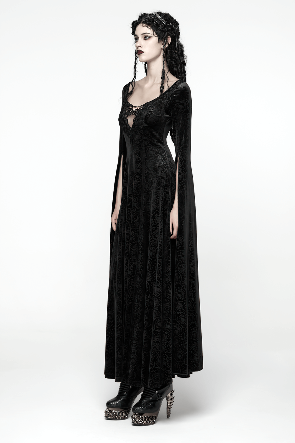 Velvet Long Dress with Gem Appliqué and Flared Sleeves in black, featuring flowing sleeves and intricate gem details.