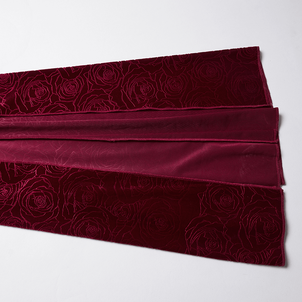 Velvet Rose Gothic Maxi Dress with Flowing Sleeves fabric featuring intricate rose patterns.