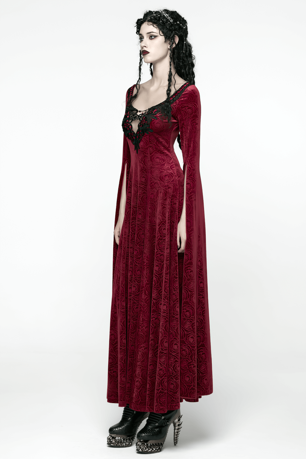 Velvet Rose Gothic Maxi Dress with Flowing Sleeves worn by a model, showcasing elegant lace details and flowing sleeves.
