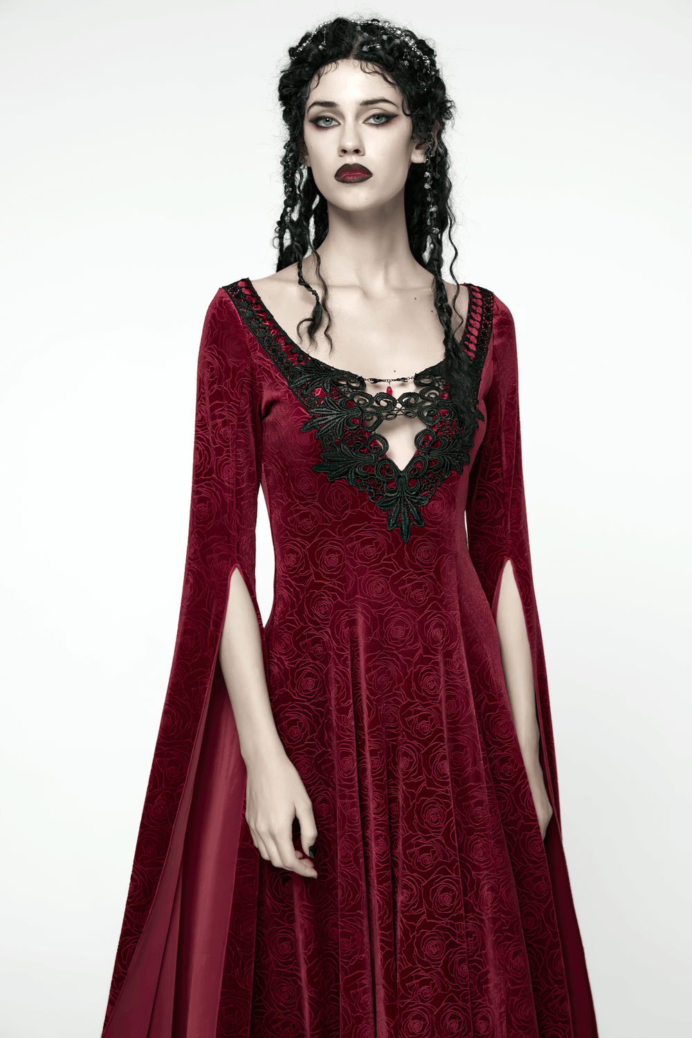 Velvet Rose Gothic Maxi Dress with Flowing Sleeves on a model showcasing its elegant design and flowing water sleeves.