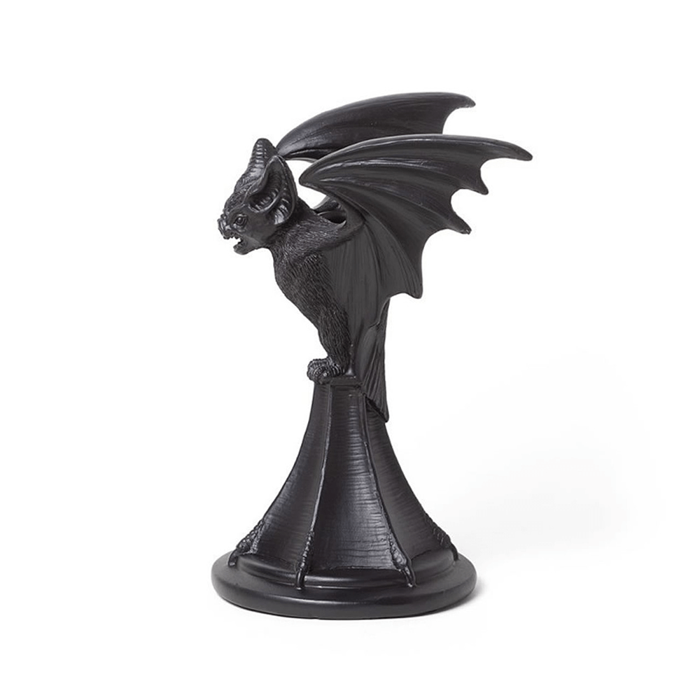 Vespertilio bat candlestick holder in black resin, perfect for gothic decor and adding dramatic flair.