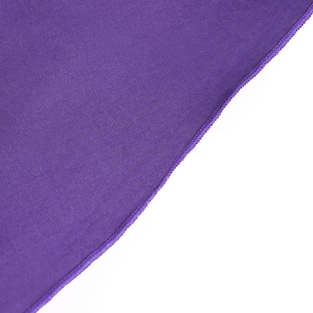 Close-up of rich purple fabric highlighting the luxurious texture of the Victorian beaded overlay skirt.