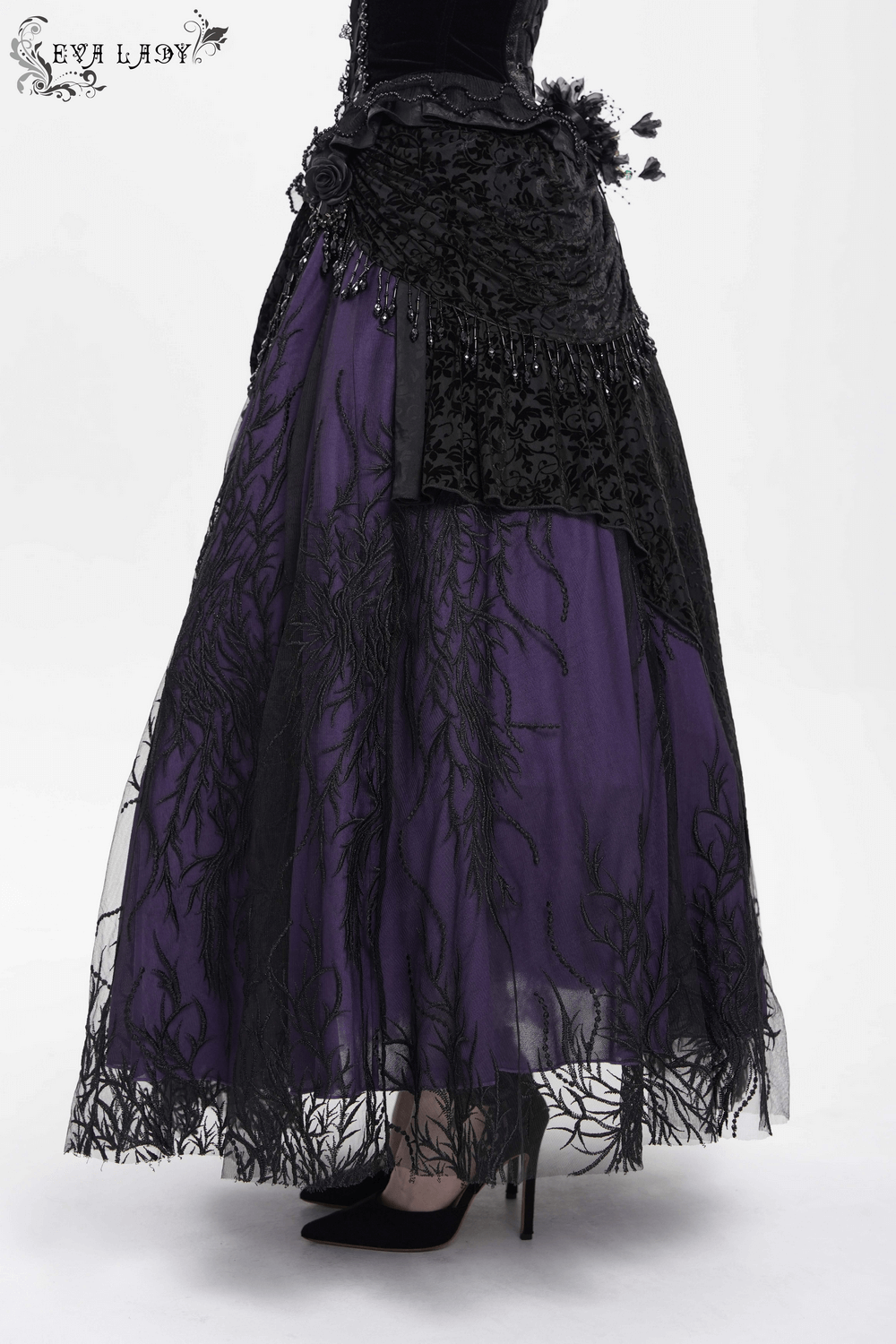 Victorian beaded overlay skirt featuring black lace, deep purple base, and floral appliques for gothic elegance.