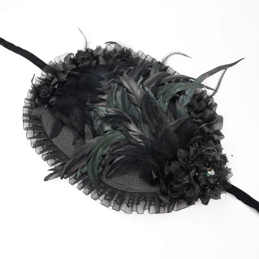 Victorian black feather bonnet with ruffled trim and ribbon ties, perfect for gothic and steampunk costumes.