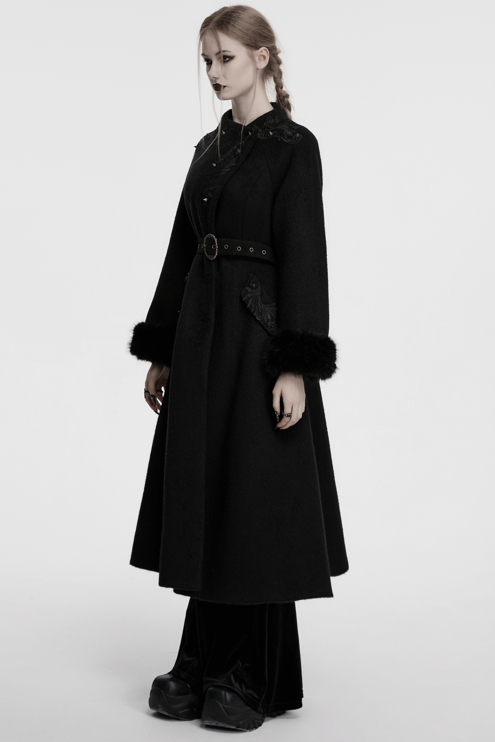 Victorian black long coat with belt and fur cuffs, featuring gothic baroque appliques and a stylish silhouette.