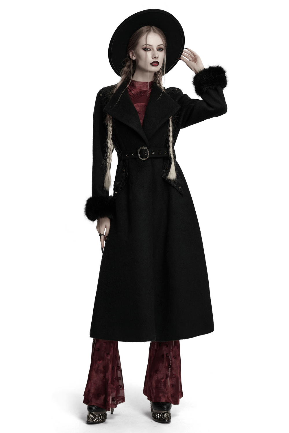 Victorian black long coat with belt and fur cuffs, featuring ornate details and a vintage gothic style.