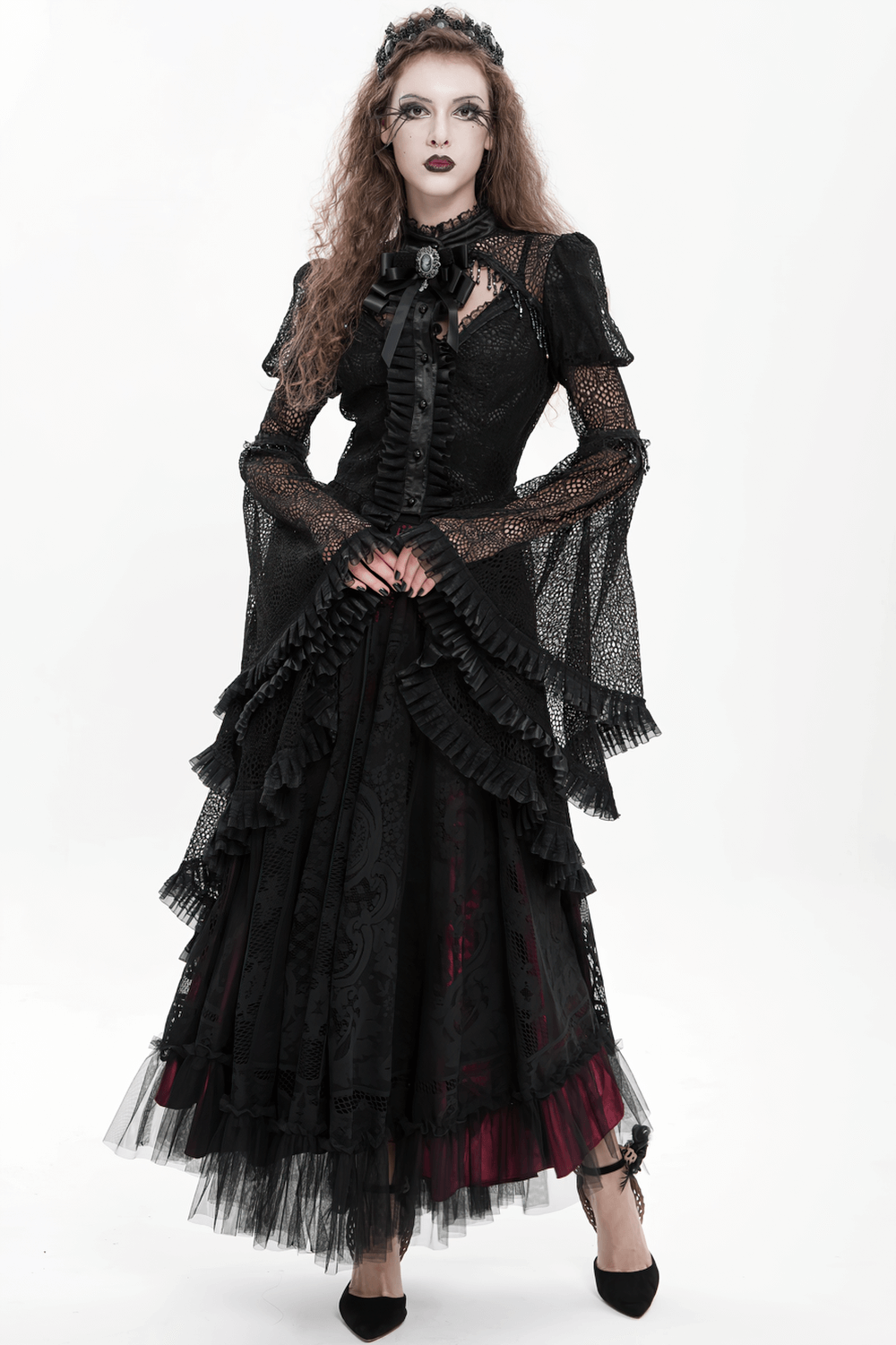 Victorian Elegant Lace Cape with Embellishments worn in a dramatic gothic fashion.
