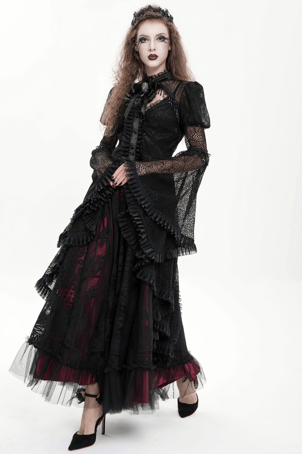 Victorian Elegant Lace Cape with Embellishments worn elegantly with ruffled layers and flowing sleeves, perfect for gothic occasions.