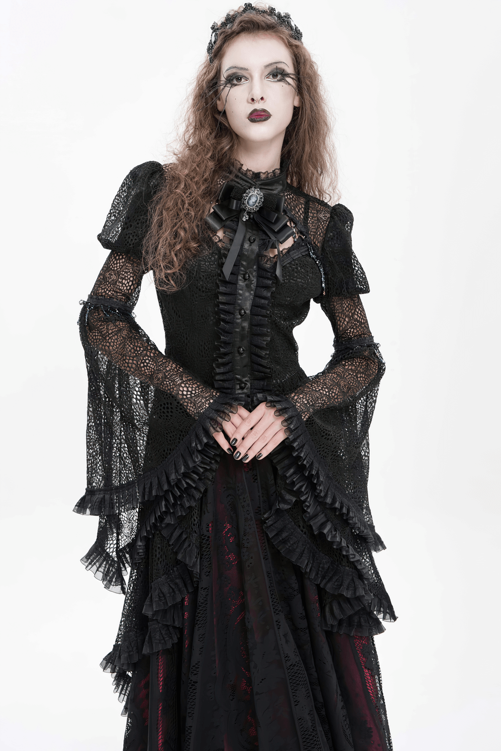 Victorian Elegant Lace Cape with Embellishments worn by a model showcasing gothic elegance in dark attire.