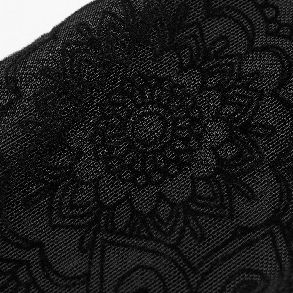 Close-up of elegant black flocking mesh featuring intricate floral patterns, perfect for Victorian-style lace gloves.