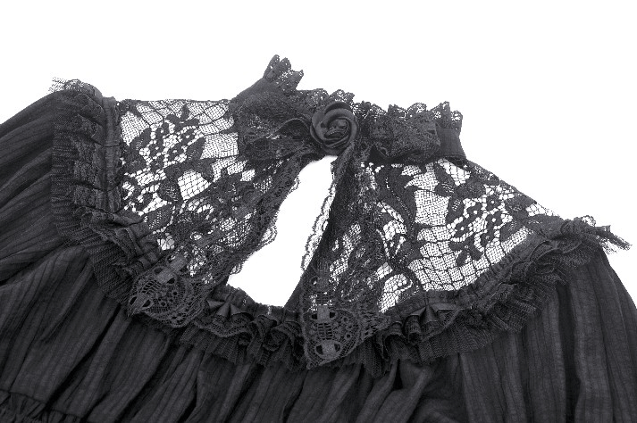 Close-up of the intricate lace collar and keyhole back of a Victorian Gothic black lace dress.