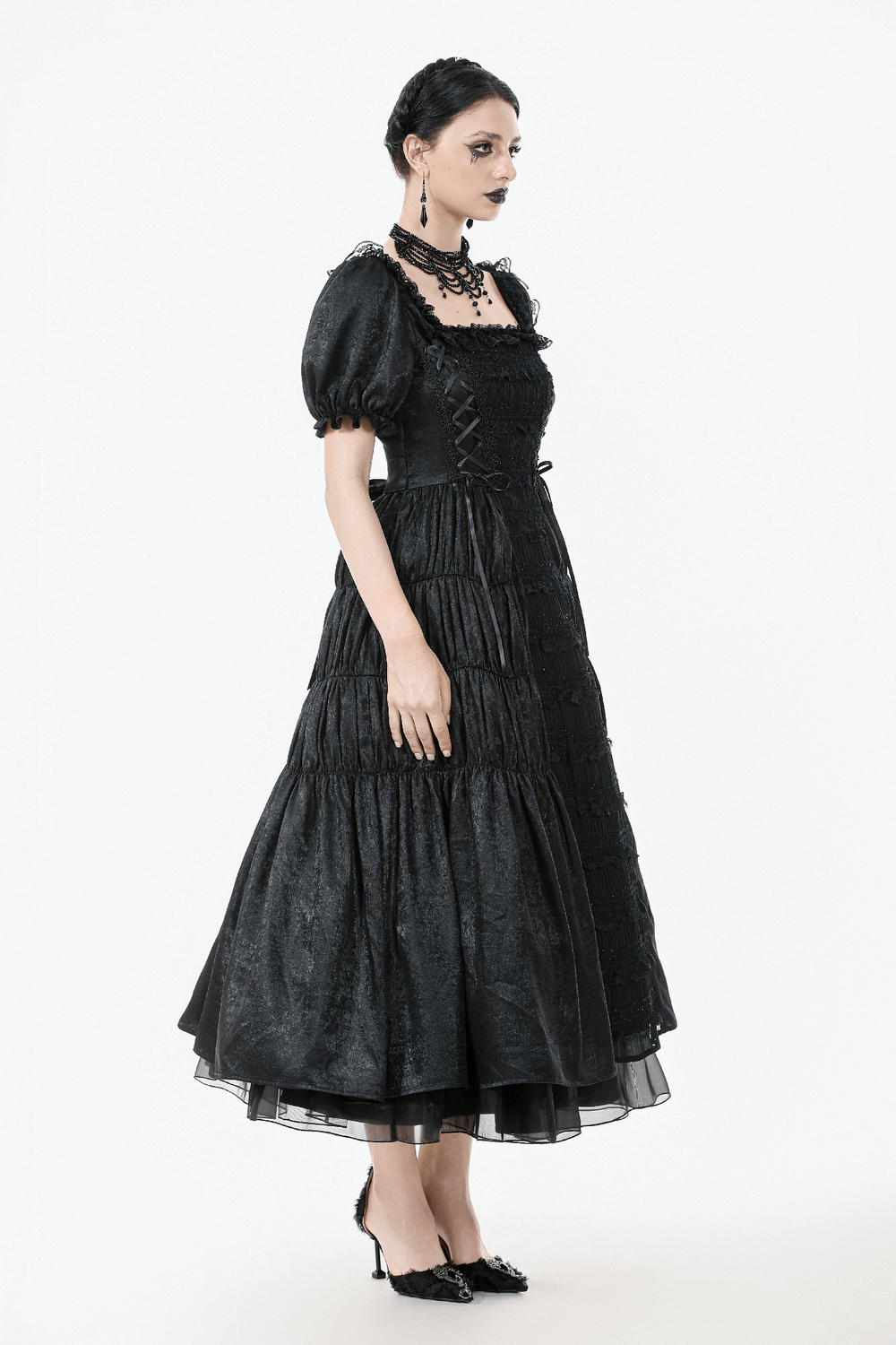 Victorian Gothic Black Puff-Sleeved Long Dress featuring puff sleeves, lace-up corset, and romantic ruffle details.
