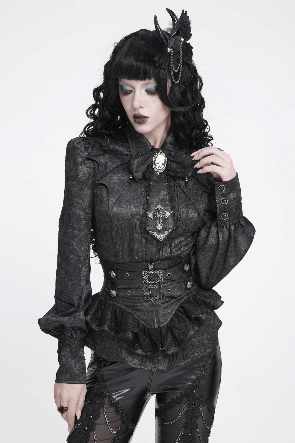 Victorian Gothic Blouse with Cross Brooch Detail black gothic shirt with bishop sleeves, cameo bow, and ornate cross accent