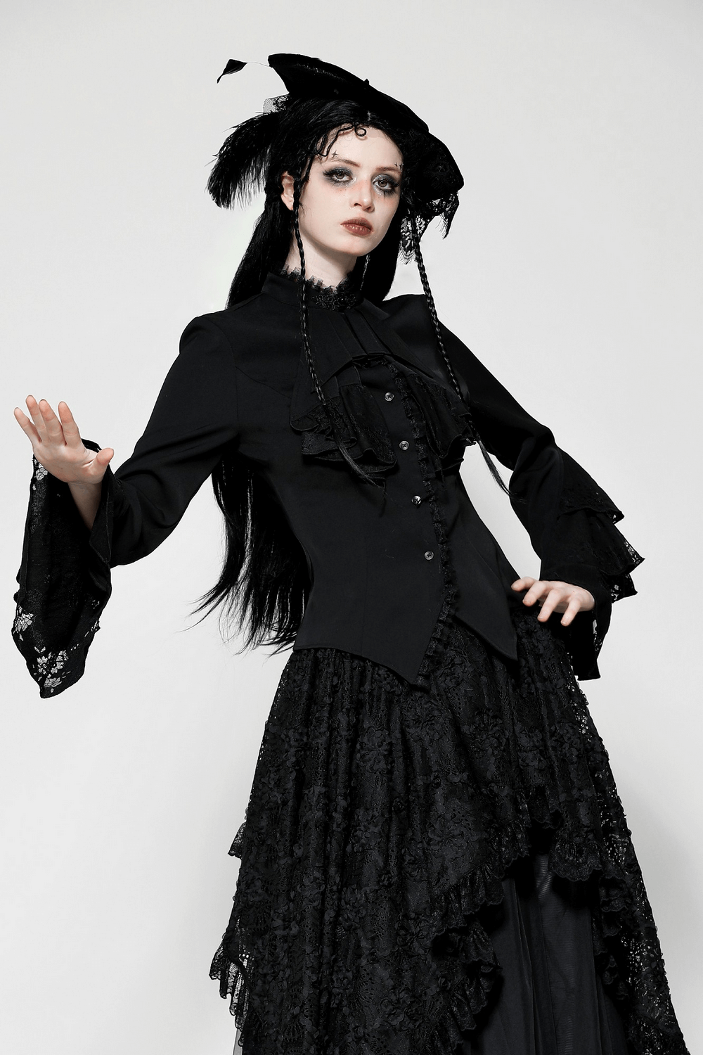 Elegant Victorian gothic blouse with lace detailing and ruffle sleeves, styled for alternative fashion lovers.