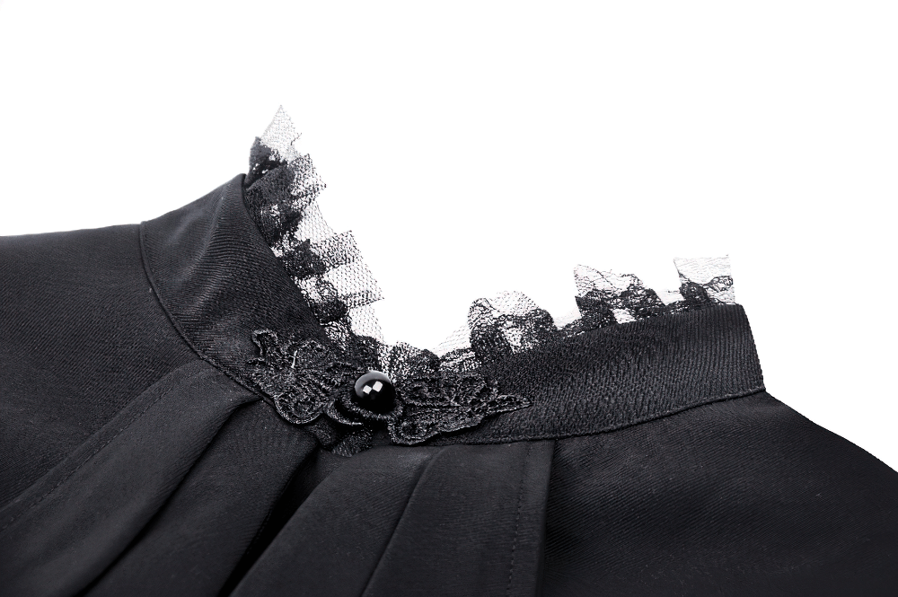 Elegant black lace collar detail of a Victorian Gothic blouse with ruffle sleeves and button closure. Perfect for alternative styles.