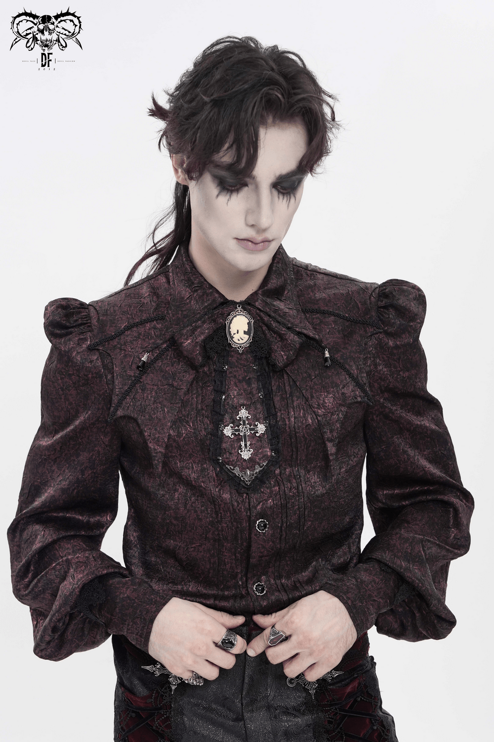 Victorian Gothic Brocade Shirt With Puff Sleeves and Tie worn by a model with a dramatic gothic style in dark colors.