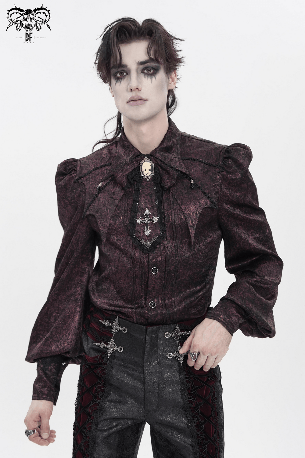 Victorian Gothic Brocade Shirt With Puff Sleeves and Tie worn by model, showcasing intricate details and dark aesthetic.