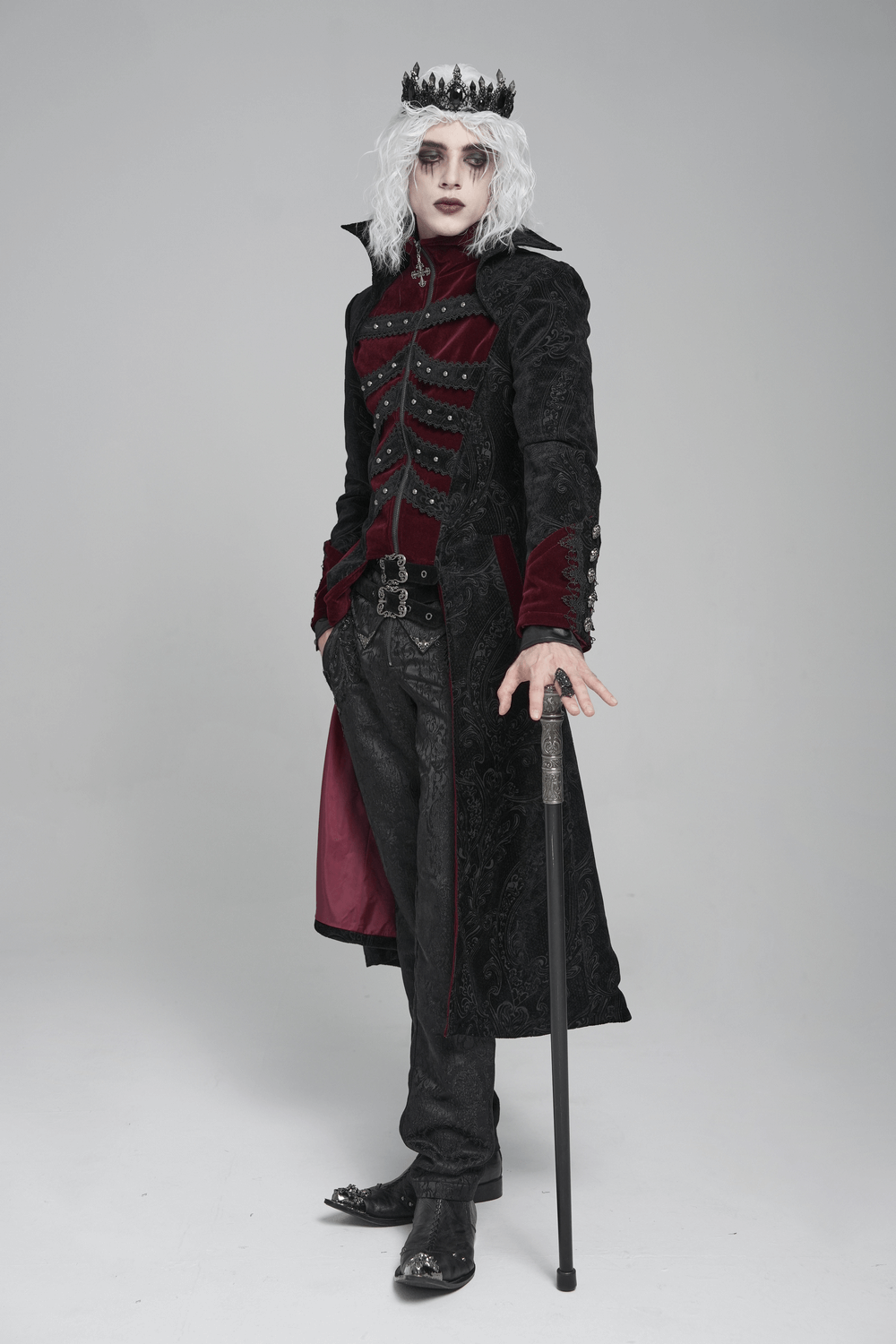 Victorian Gothic Brocade Tailcoat with Wine Red Velvet Trim worn by a model with a crown and dramatic makeup.