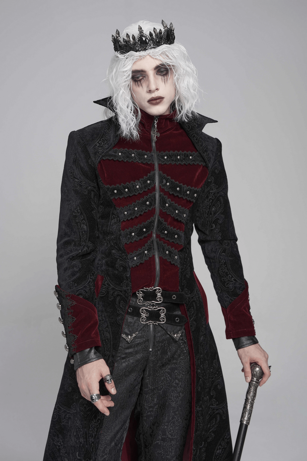 Victorian Gothic Brocade Tailcoat with Wine Red Velvet Trim worn by a model with a crown and dramatic makeup.