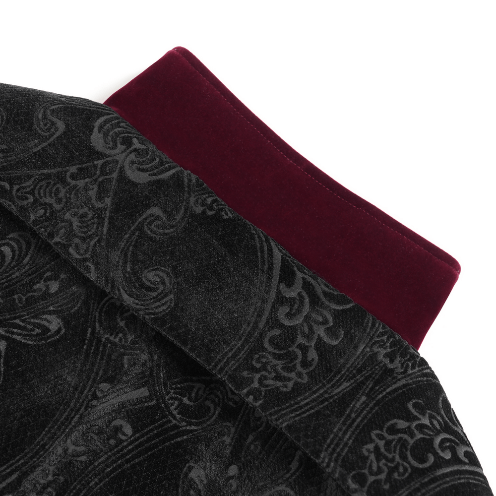 Close-up of the Victorian Gothic Brocade Tailcoat with Wine Red Velvet Trim showing black embossed fabric and rich red velvet collar.