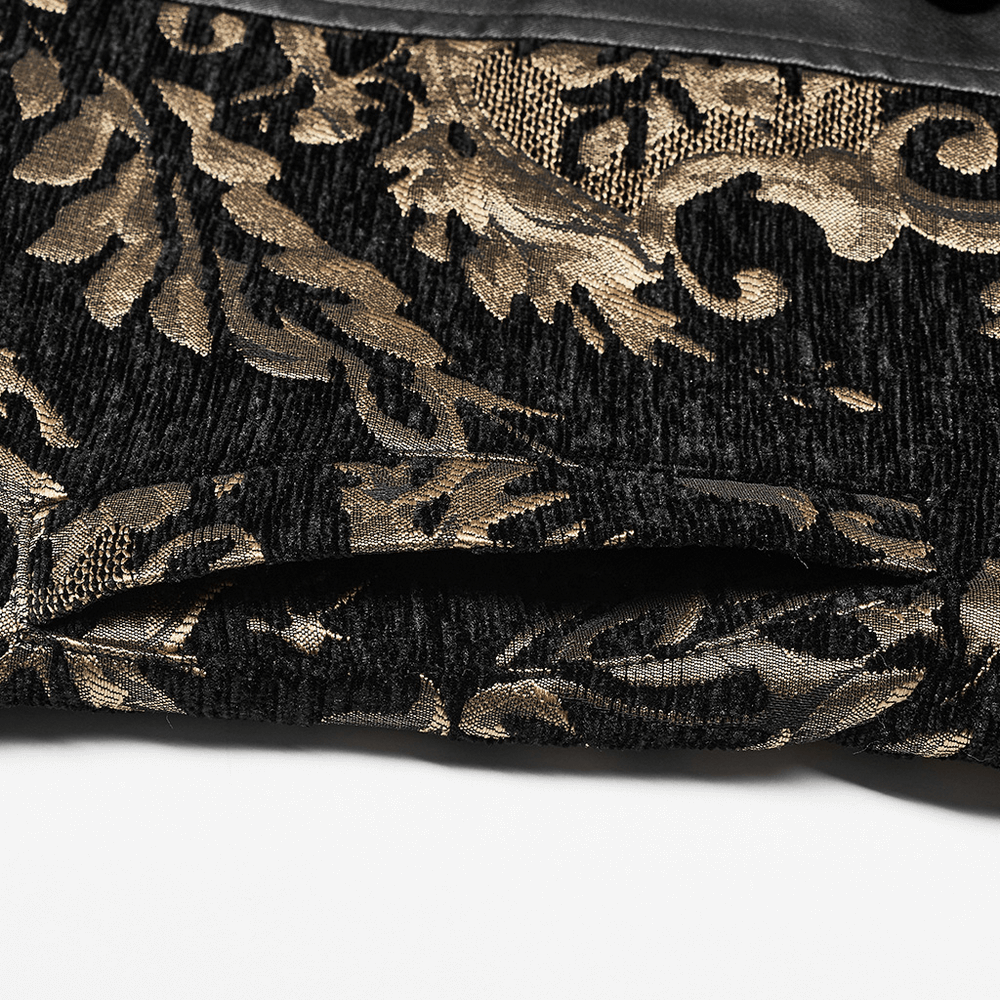 Close-up of ornate gold and black brocade fabric for gothic waistcoat, showcasing intricate design and luxurious texture.