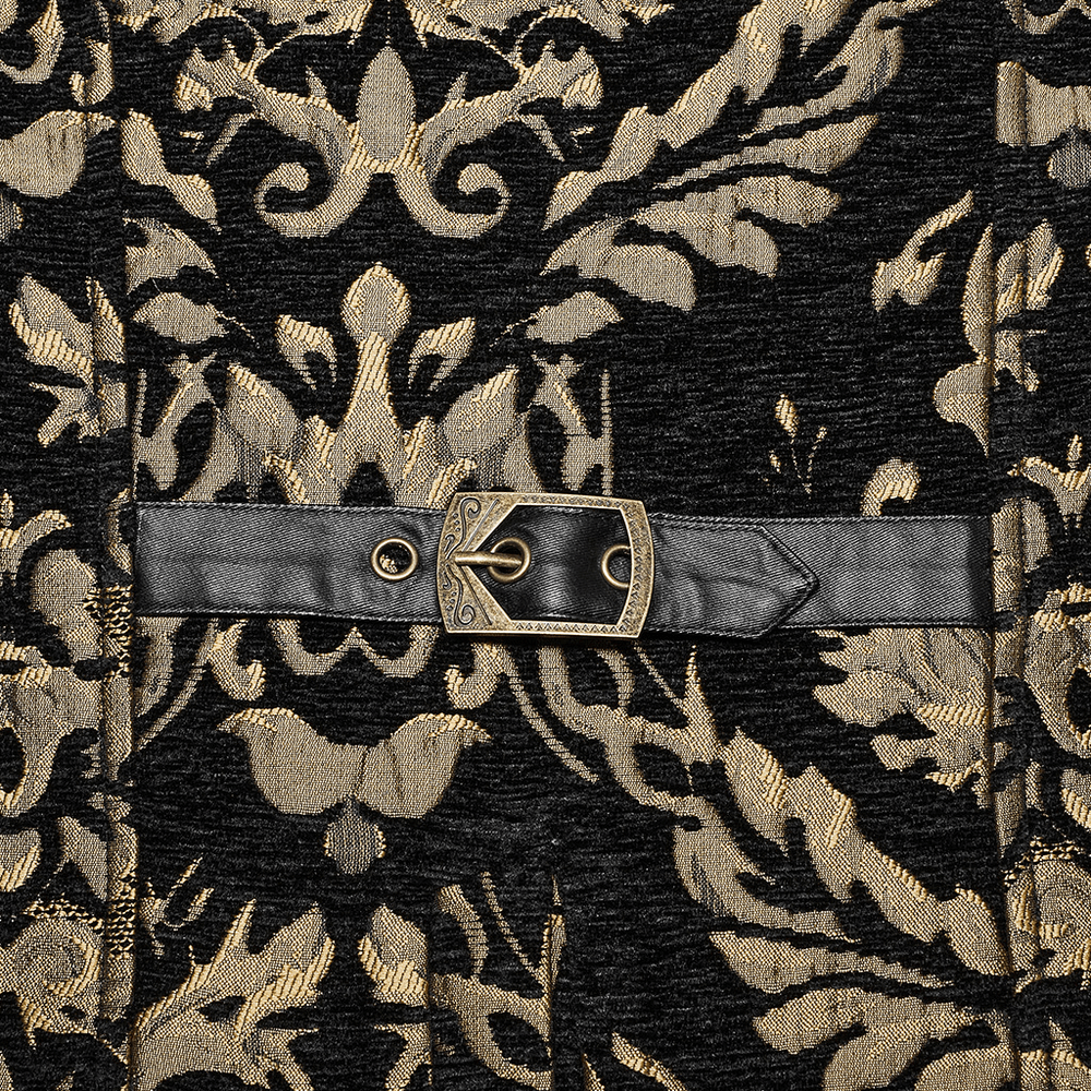 Close-up of Victorian Gothic brocade fabric with ornate gold pattern and leather waistband detail.