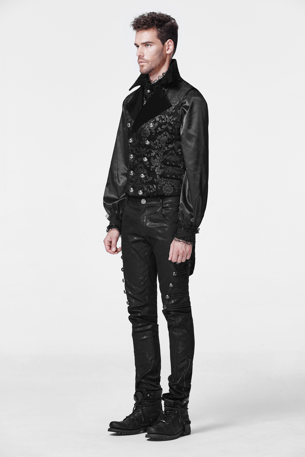 Victorian Gothic waistcoat with velvet trim and dark embellishments, paired with stylish black pants.