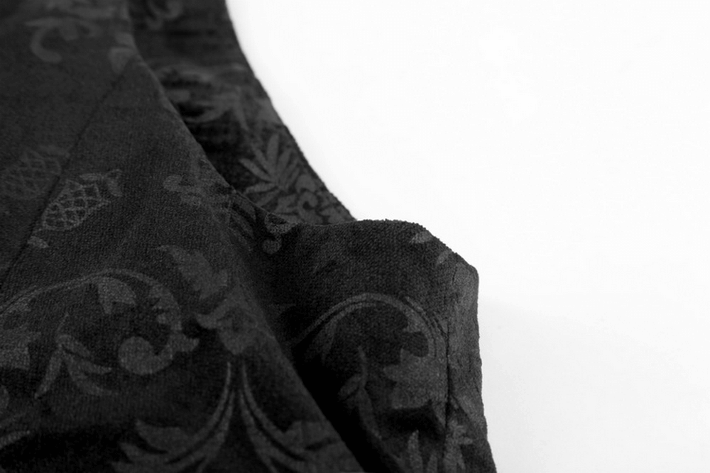 Close-up of Victorian Gothic dark printing waistcoat with luxurious velvet trim and intricate patterns.