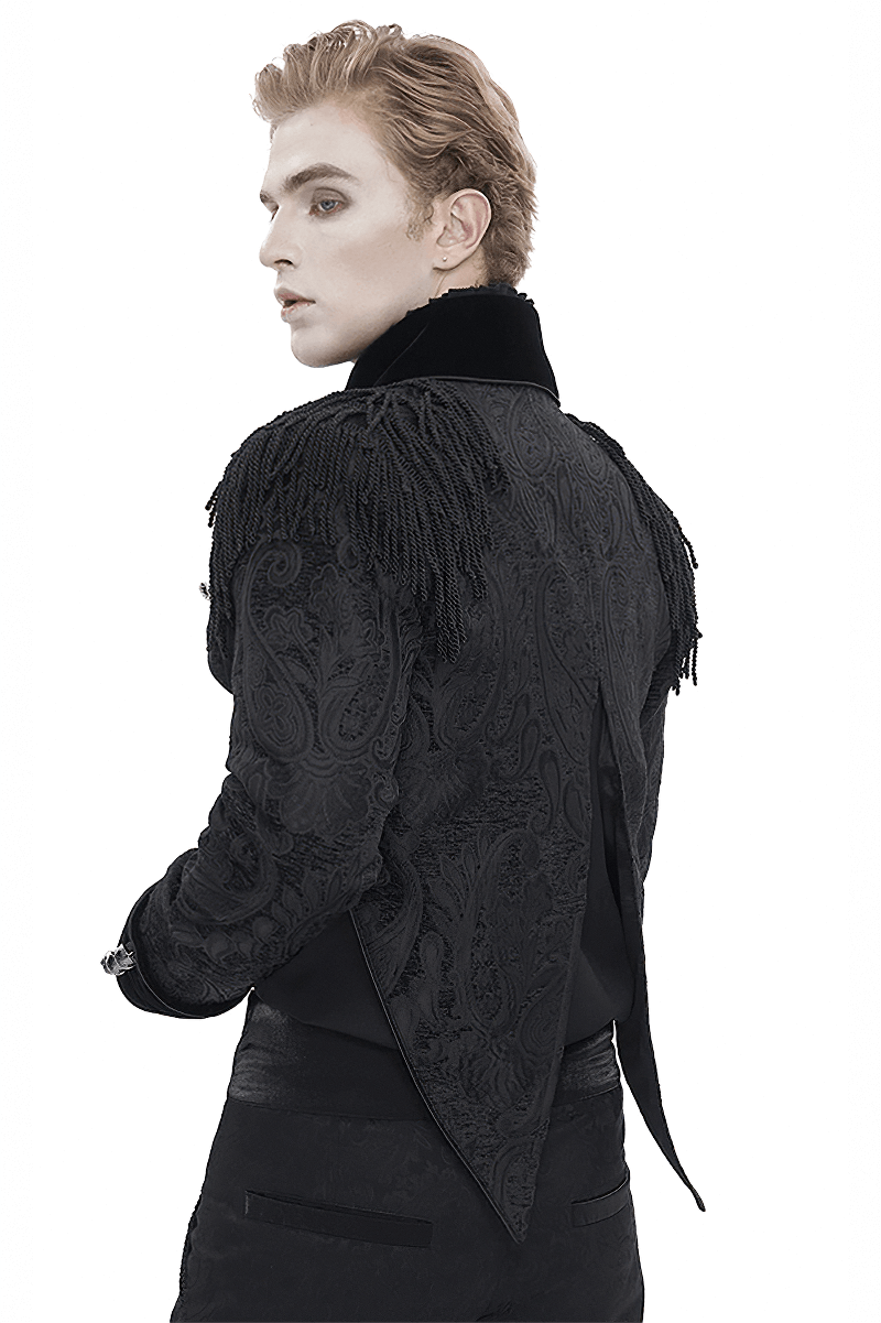 Back view of a man in a Victorian Gothic embroidered male jacket with tassels and intricate fabric design.