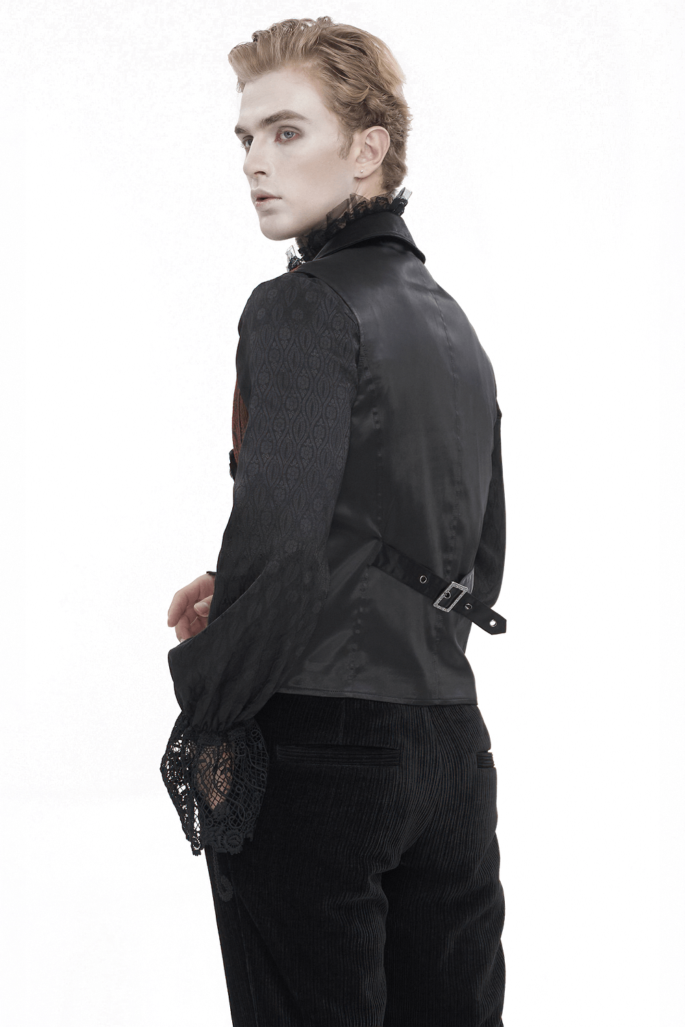 Stylish man in a Victorian Gothic embroidered waistcoat jacket showcasing intricate details.