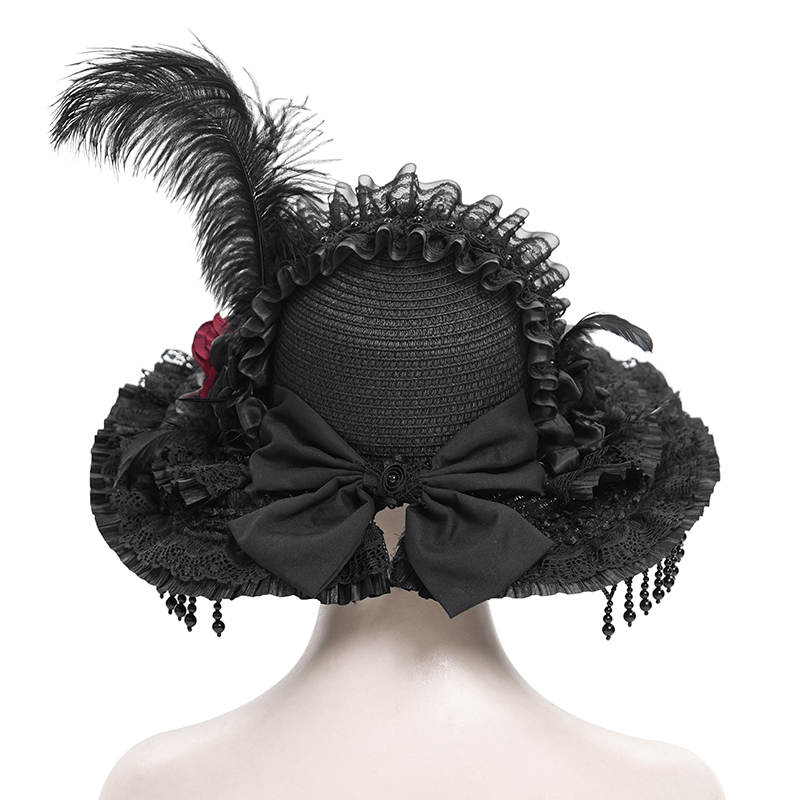 Elegant Victorian Gothic hat with ruffled lace, bold feathers, and a dramatic bow accent, perfect for gothic fashion.