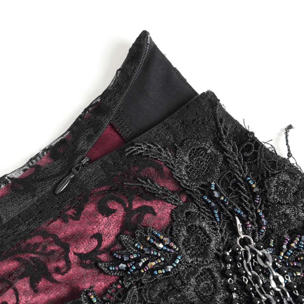 Victorian Gothic Fishtail Skirt with Chains and Sequins close-up of black lace, burgundy flocked panel, zipper, and beaded chain drapes